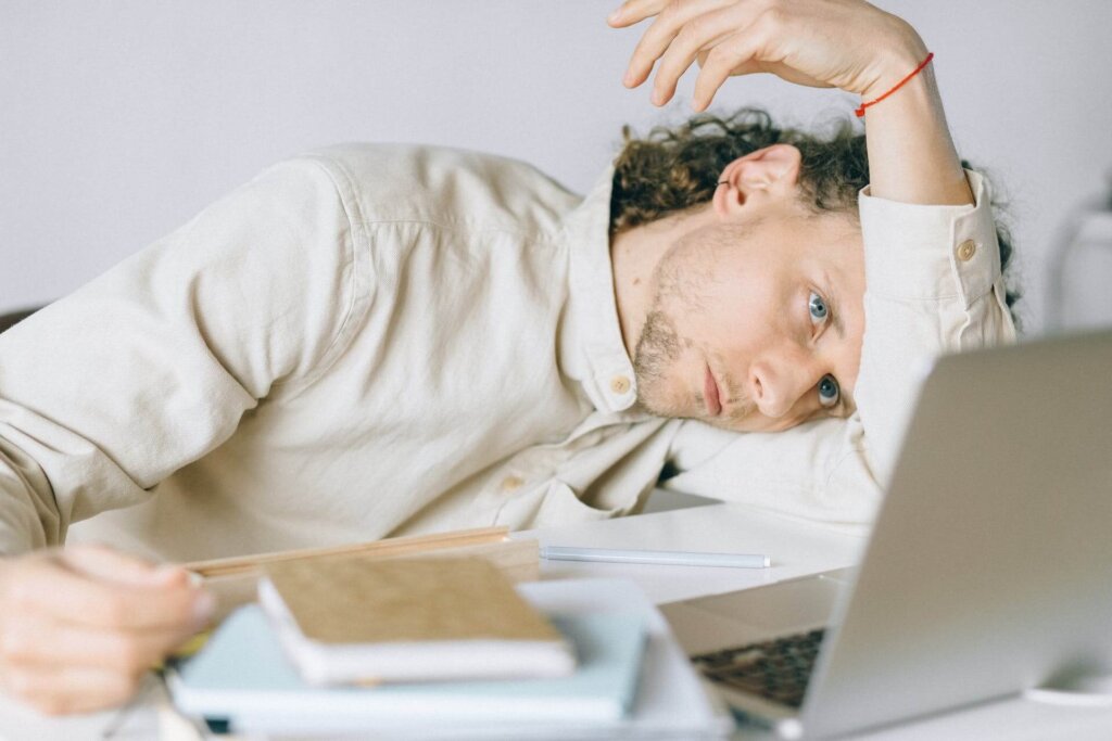  tired man staring at his computer