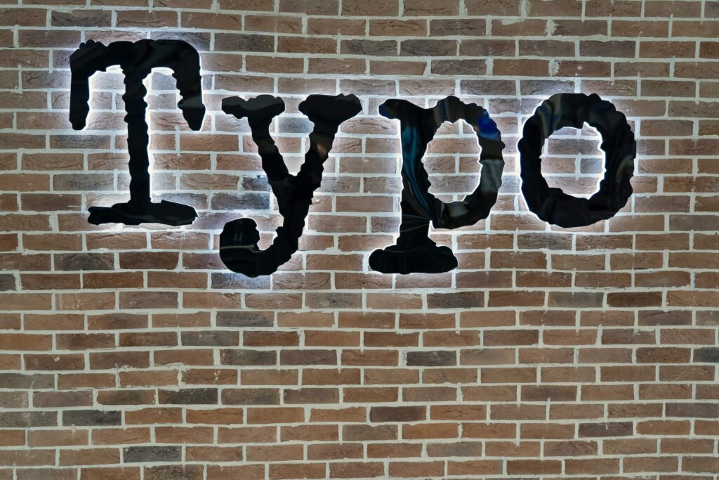 typo written on a brick wall